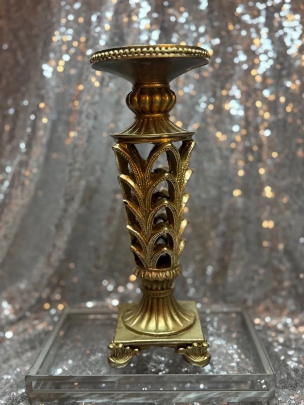 Large gold candle stick holder
